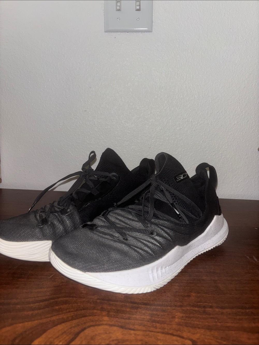 Under Armour Black and White Men's Basketball Shoes.